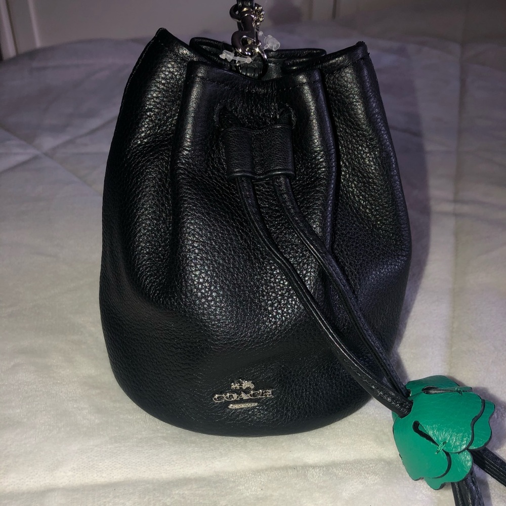 Coach pebbled leather priestly wristlet.